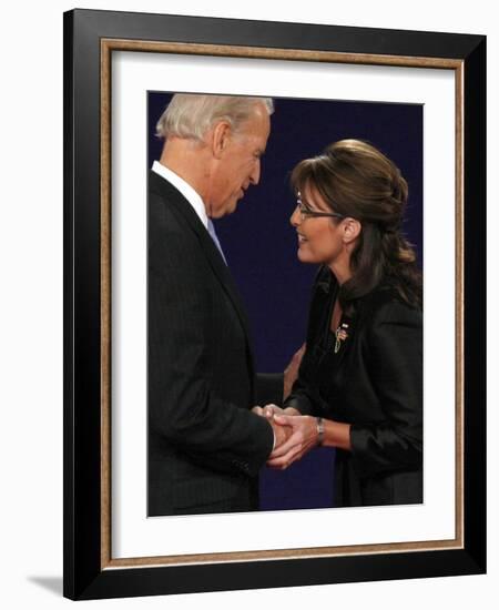 Senator Joe Biden and Governor Sarah Palin Shake Hands before the Start of Vice Presidential Debate-null-Framed Photographic Print