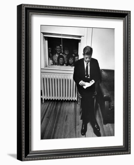 Senator John F. Kennedy Checking over Speech During His Presidential Campaign-Paul Schutzer-Framed Premium Photographic Print