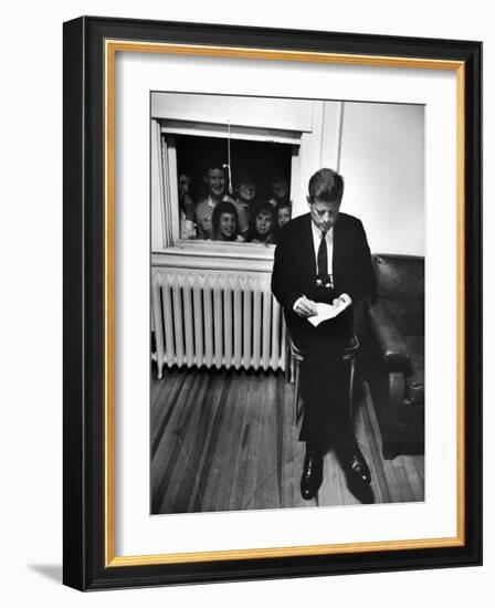 Senator John F. Kennedy Checking over Speech During His Presidential Campaign-Paul Schutzer-Framed Photographic Print