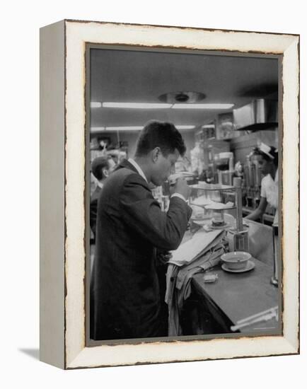 Senator John F. Kennedy Drinking a Cup of Coffee at a Cafe in Washington Airport-Ed Clark-Framed Premier Image Canvas