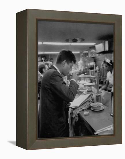 Senator John F. Kennedy Drinking a Cup of Coffee at a Cafe in Washington Airport-Ed Clark-Framed Premier Image Canvas