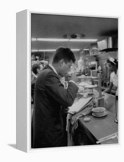 Senator John F. Kennedy Drinking a Cup of Coffee at a Cafe in Washington Airport-Ed Clark-Framed Premier Image Canvas