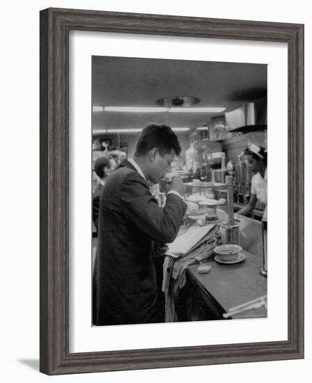 Senator John F. Kennedy Drinking a Cup of Coffee at a Cafe in Washington Airport-Ed Clark-Framed Photographic Print