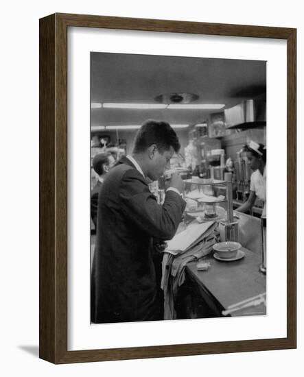 Senator John F. Kennedy Drinking a Cup of Coffee at a Cafe in Washington Airport-Ed Clark-Framed Photographic Print