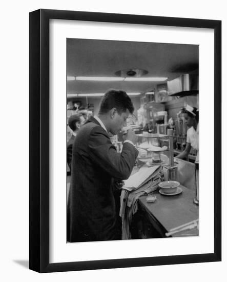 Senator John F. Kennedy Drinking a Cup of Coffee at a Cafe in Washington Airport-Ed Clark-Framed Photographic Print