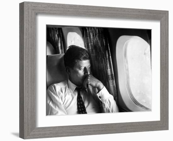 Senator John F. Kennedy on His Private Plane During His Presidential Campaign-Paul Schutzer-Framed Photographic Print