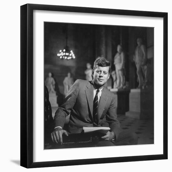 Senator John F. Kennedy Seated in Museum W. Statues-null-Framed Photographic Print