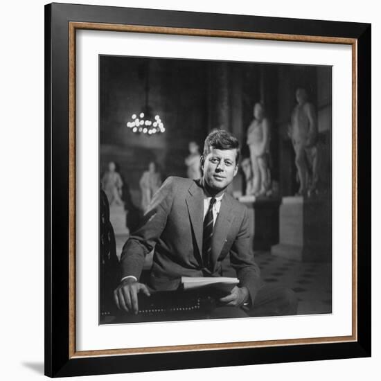 Senator John F. Kennedy Seated in Museum W. Statues-null-Framed Photographic Print