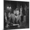 Senator John F. Kennedy Seated in Museum W. Statues-null-Mounted Photographic Print