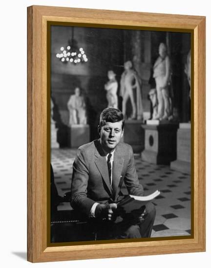 Senator John F. Kennedy Seated in Museum with Statues-Hank Walker-Framed Premier Image Canvas