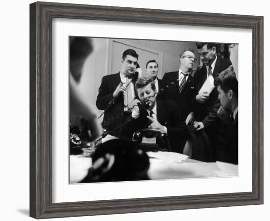 Senator John F. Kennedy Talking on the Phone Surrounded by Aides During the Primary Elections-Stan Wayman-Framed Photographic Print