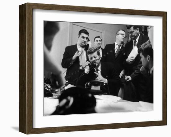 Senator John F. Kennedy Talking on the Phone Surrounded by Aides During the Primary Elections-Stan Wayman-Framed Photographic Print