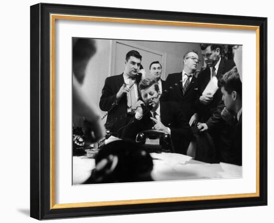 Senator John F. Kennedy Talking on the Phone Surrounded by Aides During the Primary Elections-Stan Wayman-Framed Photographic Print