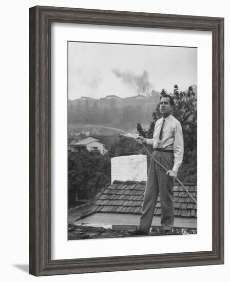 Senator Richard M. Nixon on Roof of Home in Los Angeles, Putting Out Fires Caused by Brush Blaze-Allan Grant-Framed Photographic Print