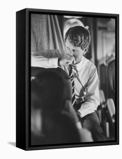 Senator Robert F. Kennedy Aboard Plane During Trip to Help Local Candidates-Bill Eppridge-Framed Premier Image Canvas