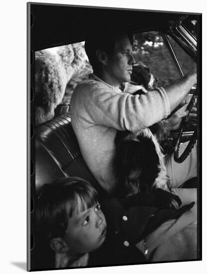 Senator Robert Kennedy Driving Car with Pet Springer Spaniel over His Lap and Son Max Beside Him-Bill Eppridge-Mounted Photographic Print