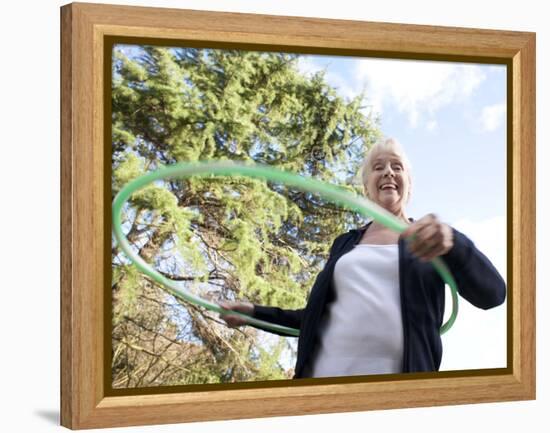 Senior Woman Hula-hooping-Science Photo Library-Framed Premier Image Canvas