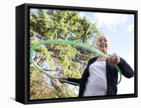 Senior Woman Hula-hooping-Science Photo Library-Framed Premier Image Canvas