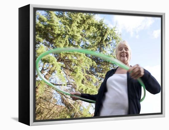 Senior Woman Hula-hooping-Science Photo Library-Framed Premier Image Canvas