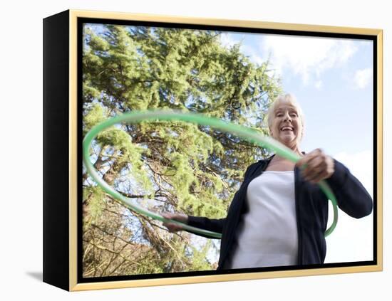 Senior Woman Hula-hooping-Science Photo Library-Framed Premier Image Canvas