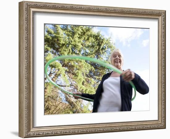 Senior Woman Hula-hooping-Science Photo Library-Framed Photographic Print