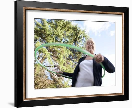 Senior Woman Hula-hooping-Science Photo Library-Framed Photographic Print