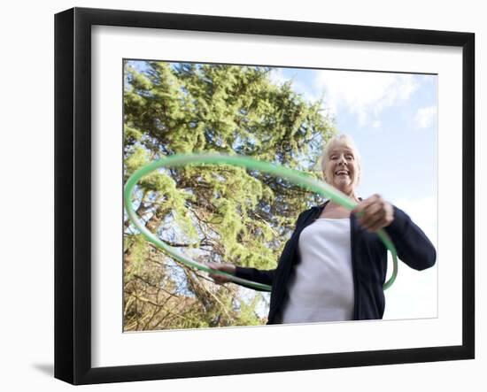 Senior Woman Hula-hooping-Science Photo Library-Framed Photographic Print