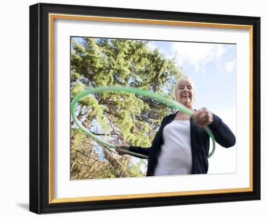 Senior Woman Hula-hooping-Science Photo Library-Framed Photographic Print