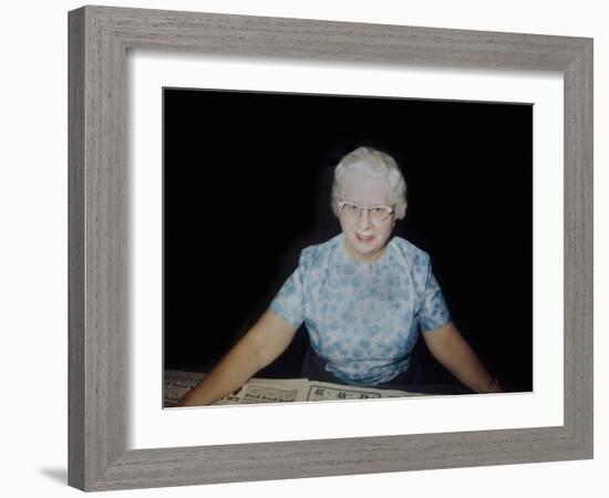 Senior Woman with Newspaper Clippings, Ca. 1962.-Kirn Vintage Stock-Framed Photographic Print