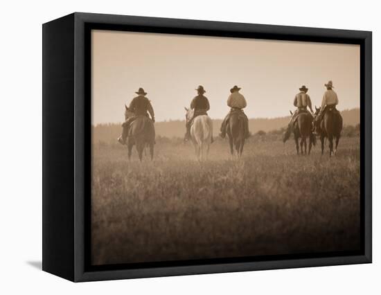 Sepia Effect of Cowboys Riding, Seneca, Oregon, USA-Nancy & Steve Ross-Framed Premier Image Canvas