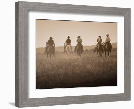 Sepia Effect of Cowboys Riding, Seneca, Oregon, USA-Nancy & Steve Ross-Framed Photographic Print