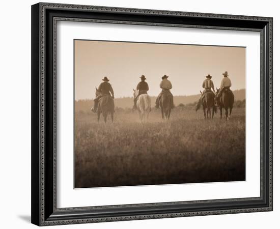 Sepia Effect of Cowboys Riding, Seneca, Oregon, USA-Nancy & Steve Ross-Framed Photographic Print