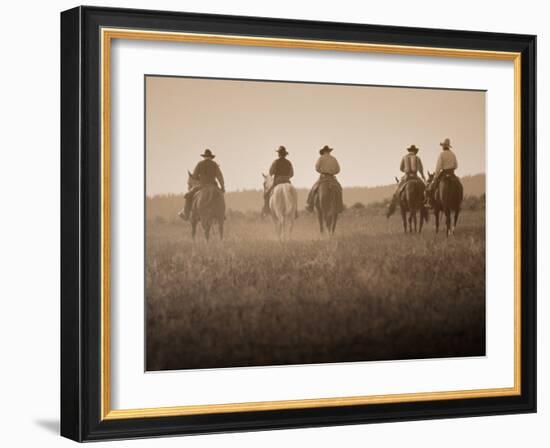 Sepia Effect of Cowboys Riding, Seneca, Oregon, USA-Nancy & Steve Ross-Framed Photographic Print