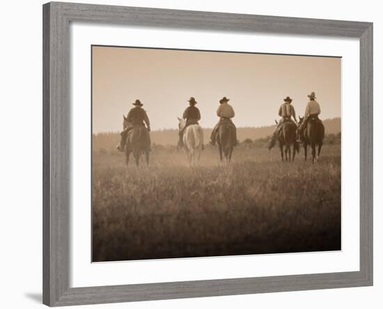 Sepia Effect of Cowboys Riding, Seneca, Oregon, USA-Nancy & Steve Ross-Framed Photographic Print