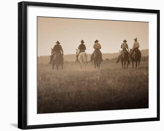 Sepia Effect of Cowboys Riding, Seneca, Oregon, USA-Nancy & Steve Ross-Framed Photographic Print