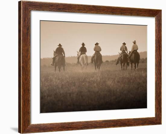 Sepia Effect of Cowboys Riding, Seneca, Oregon, USA-Nancy & Steve Ross-Framed Photographic Print