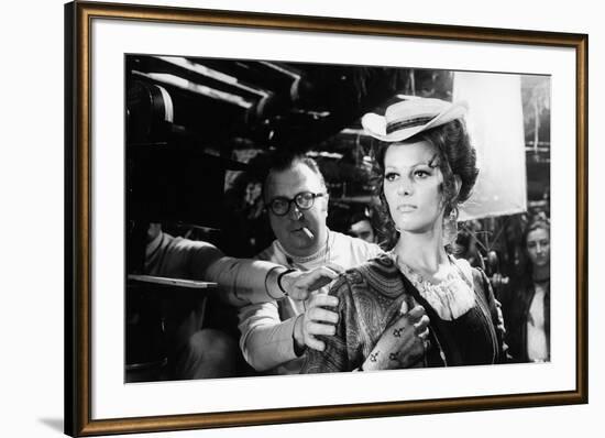 Sergio Leone (1929 - 1989) and Claudia Cardinale during the shooting of Once Upon a Time in the Wes-null-Framed Photo