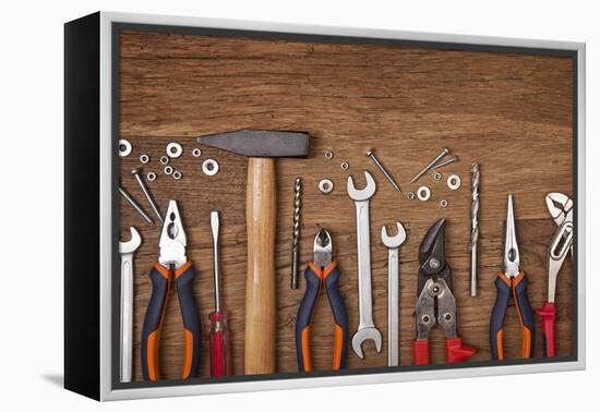 Set of Different Tools on Wooden Background-egal-Framed Premier Image Canvas