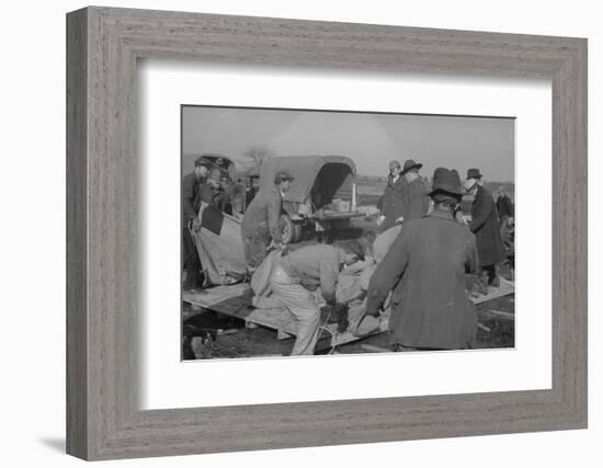 Setting up a tent in the camp for white flood refugees at Forrest City, Arkansas, 1937-Walker Evans-Framed Photographic Print