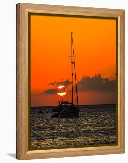 Seven Mile Beach, Grand Cayman. Sailboat on the Carribean at sunset.-Jolly Sienda-Framed Premier Image Canvas