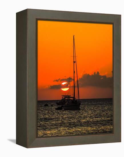 Seven Mile Beach, Grand Cayman. Sailboat on the Carribean at sunset.-Jolly Sienda-Framed Premier Image Canvas