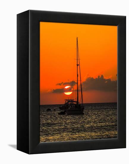 Seven Mile Beach, Grand Cayman. Sailboat on the Carribean at sunset.-Jolly Sienda-Framed Premier Image Canvas