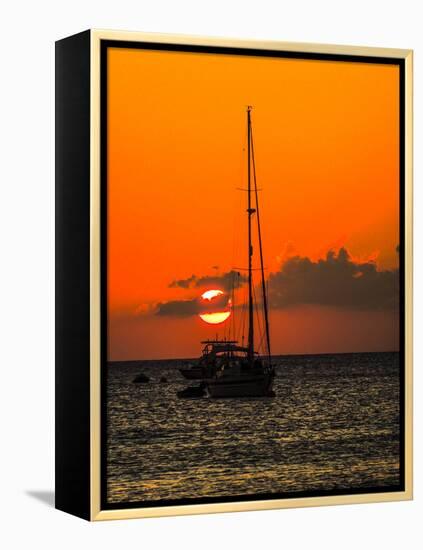 Seven Mile Beach, Grand Cayman. Sailboat on the Carribean at sunset.-Jolly Sienda-Framed Premier Image Canvas