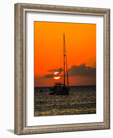 Seven Mile Beach, Grand Cayman. Sailboat on the Carribean at sunset.-Jolly Sienda-Framed Photographic Print