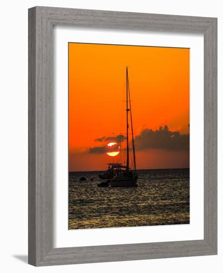 Seven Mile Beach, Grand Cayman. Sailboat on the Carribean at sunset.-Jolly Sienda-Framed Photographic Print