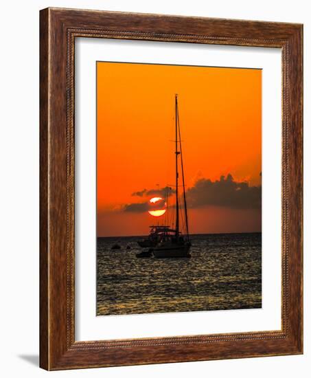 Seven Mile Beach, Grand Cayman. Sailboat on the Carribean at sunset.-Jolly Sienda-Framed Photographic Print