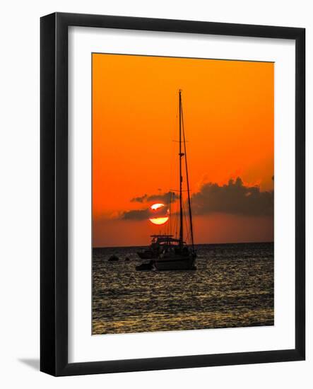 Seven Mile Beach, Grand Cayman. Sailboat on the Carribean at sunset.-Jolly Sienda-Framed Photographic Print