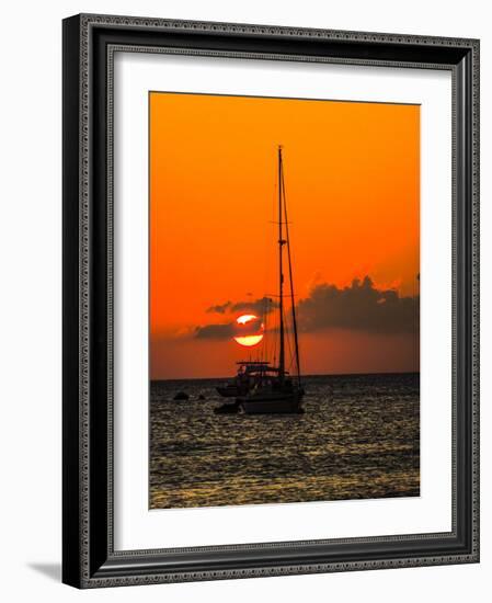 Seven Mile Beach, Grand Cayman. Sailboat on the Carribean at sunset.-Jolly Sienda-Framed Photographic Print