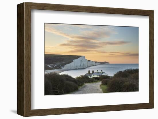 Seven Sisters and Beachy Head with coastguard cottages at sunrise in spring, Seaford Head-Stuart Black-Framed Photographic Print