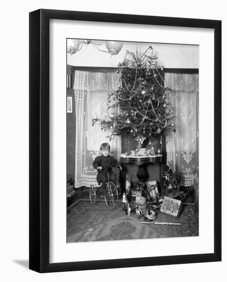 Seymour Boy Posed Seated on Tricycle Beside Christmas Tree in Parlor, Christmas 1912-William Davis Hassler-Framed Photographic Print